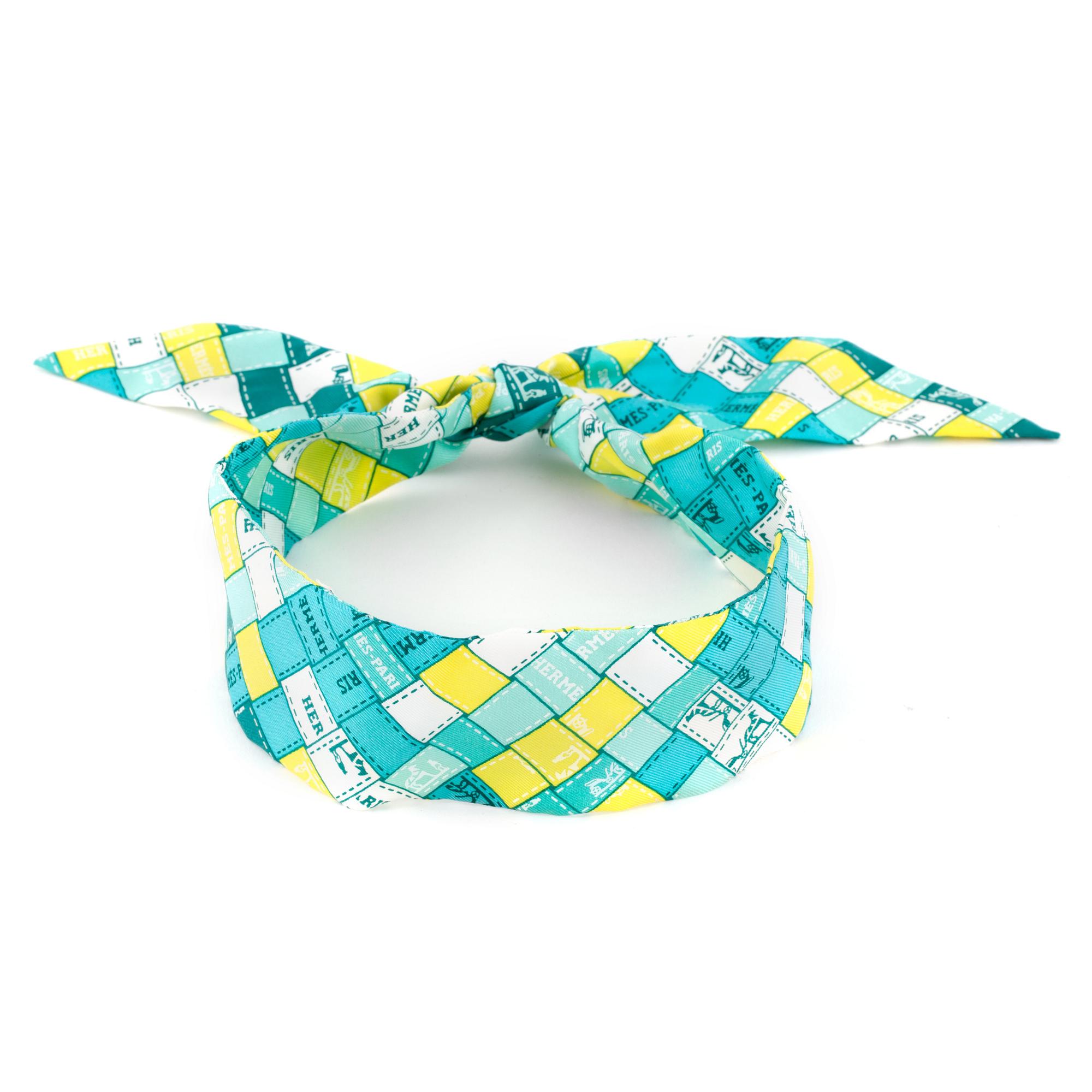 HERMÈS,  a silk hairband.