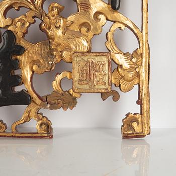 A pair of Chinese wooden panels, late Qing dynasty / around 1900.