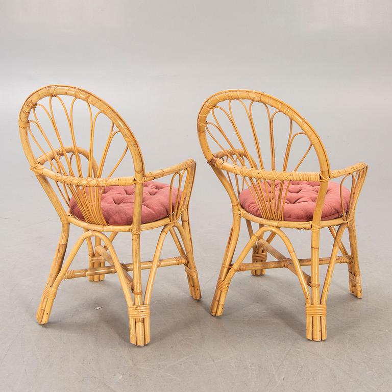 A pair of bamboo and rattan 1960/70s armchairs.