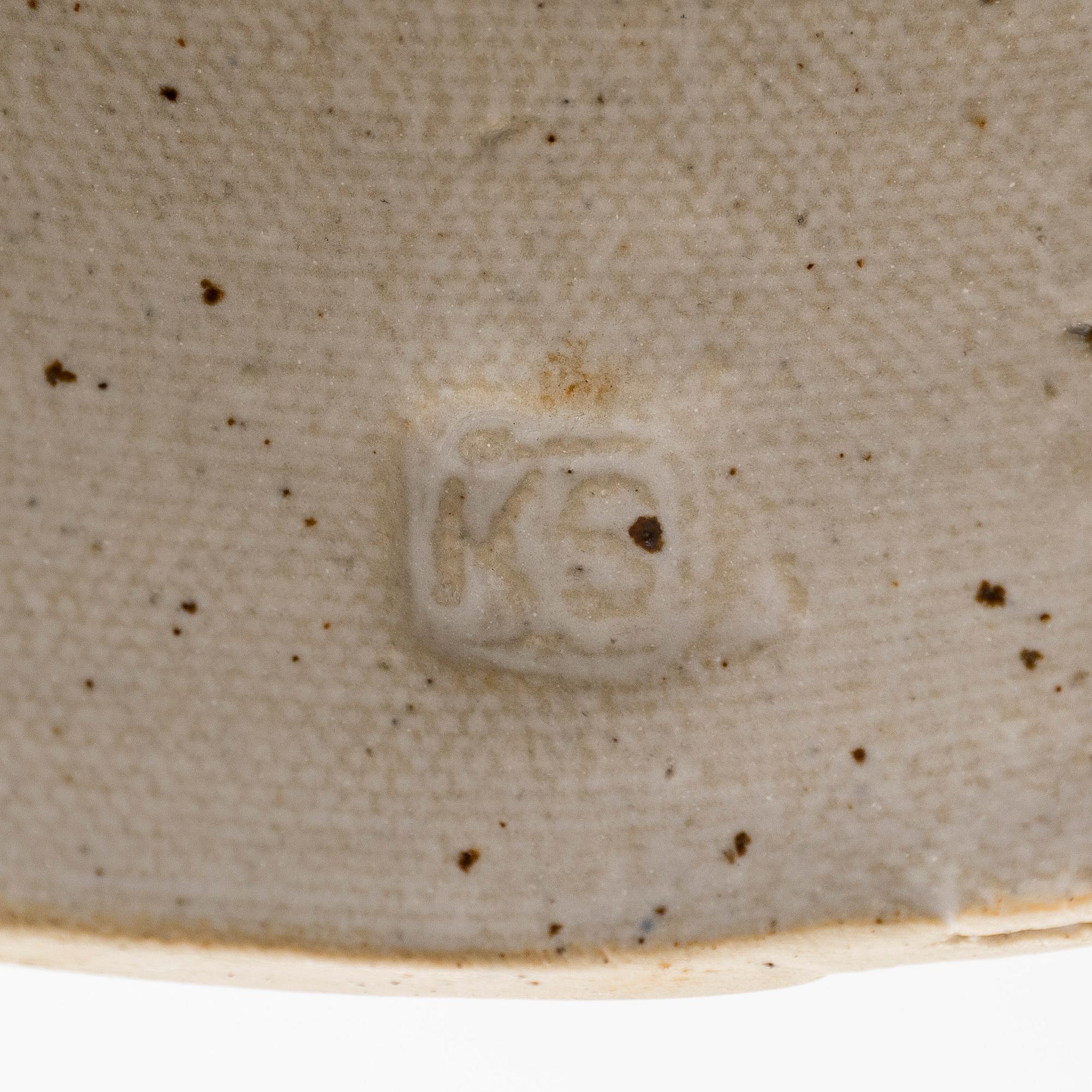 Kyllikki Salmenhaara, A white stoneware ' Winding' sculpture signed KS.