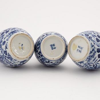 A set of three blue and white vases, Qing dynasty, 19th century.
