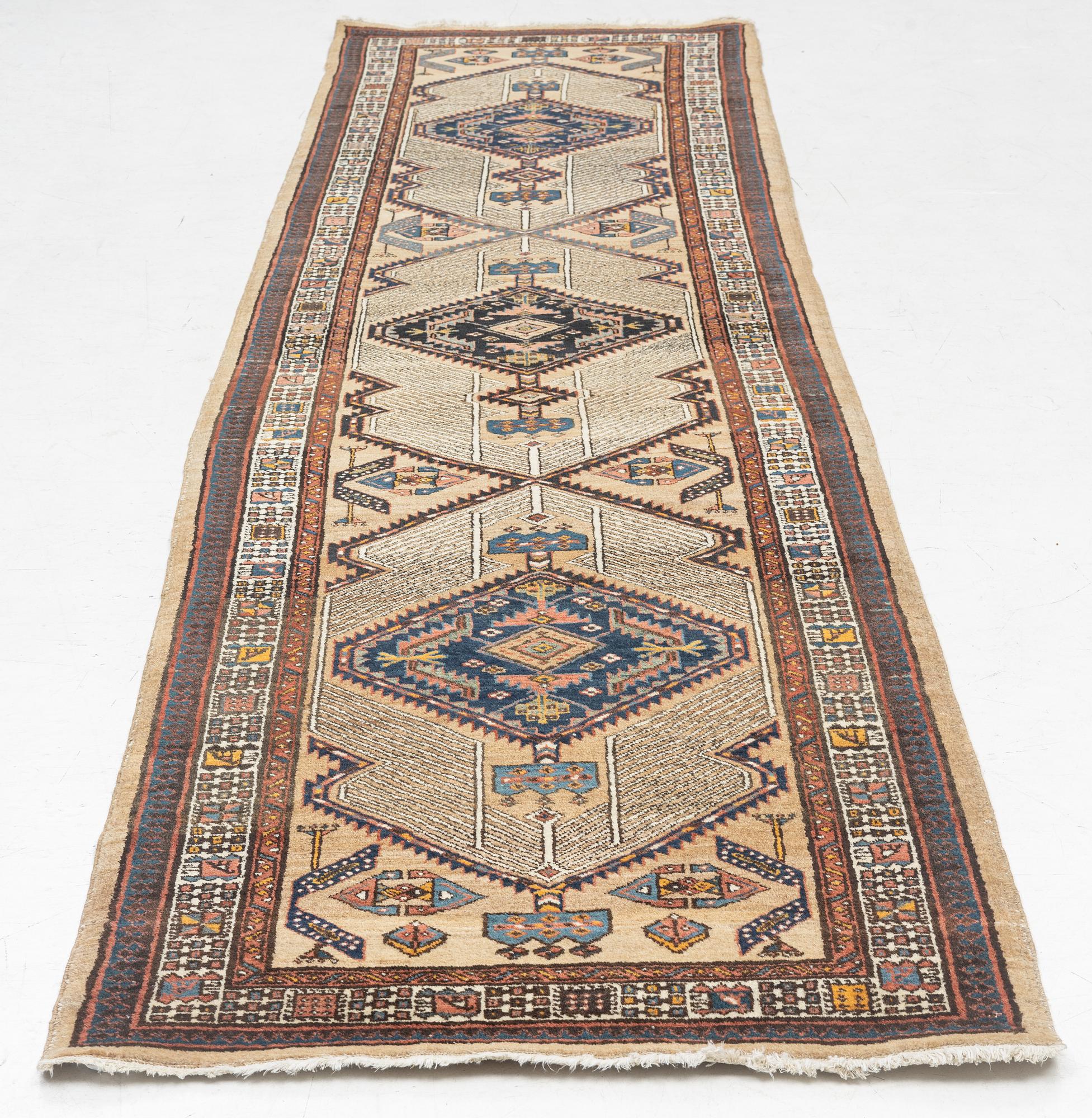 A Sarab runner, semi-antique, c. 350 x 90 cm.