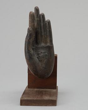 A  Thai bronze Buddha hand.