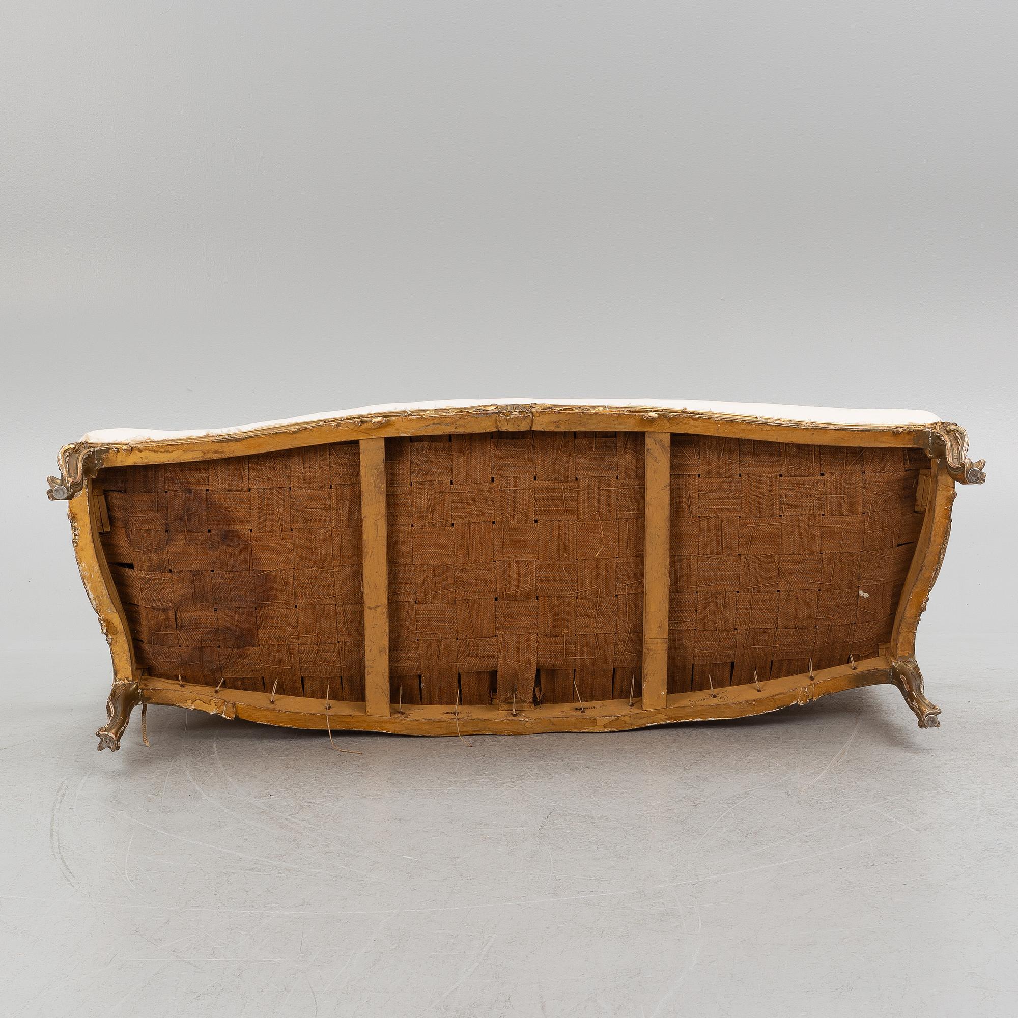 A Rococo style sofa, later part of the 19th century.