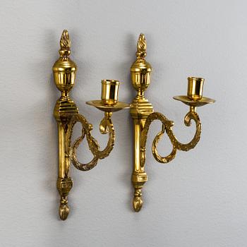 A pair of brass 'Törne' wall sconce, Ikeas 18th century Swedish Furniture series.