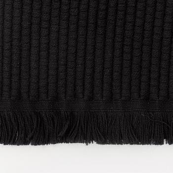 Gucci, a black wool scarf.