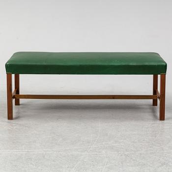 A bench "2082" by Josef Frank for Firma Svenskt Tenn.