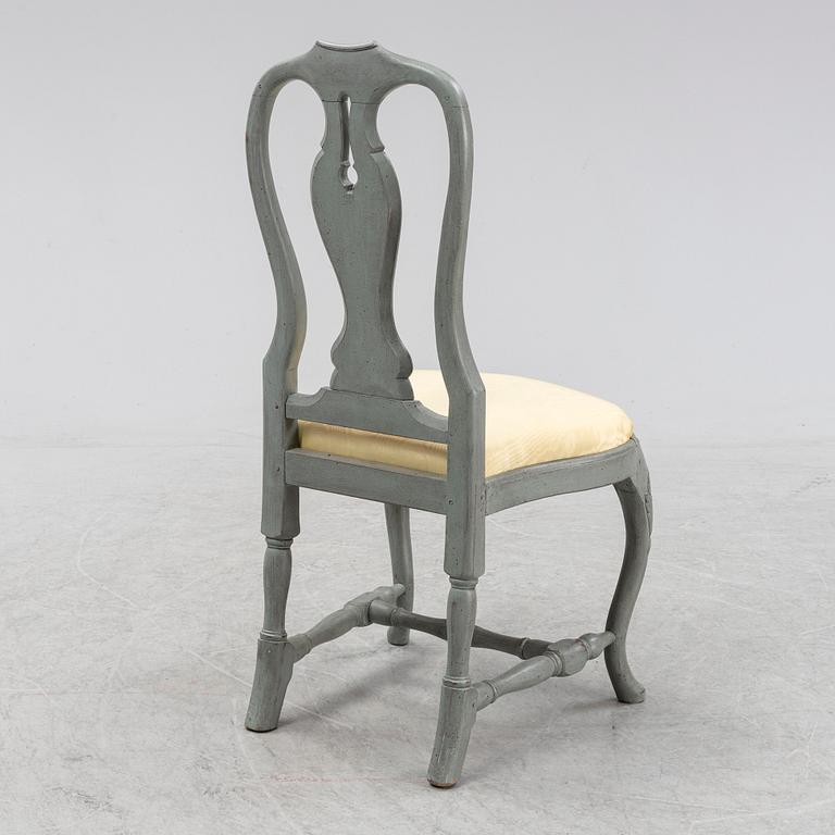 Skrivbord, rokokostil, samt stol.