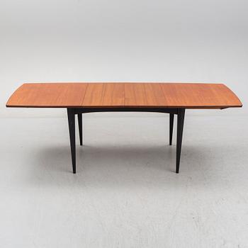 A 1950s/1960s teak and teak veneer table.