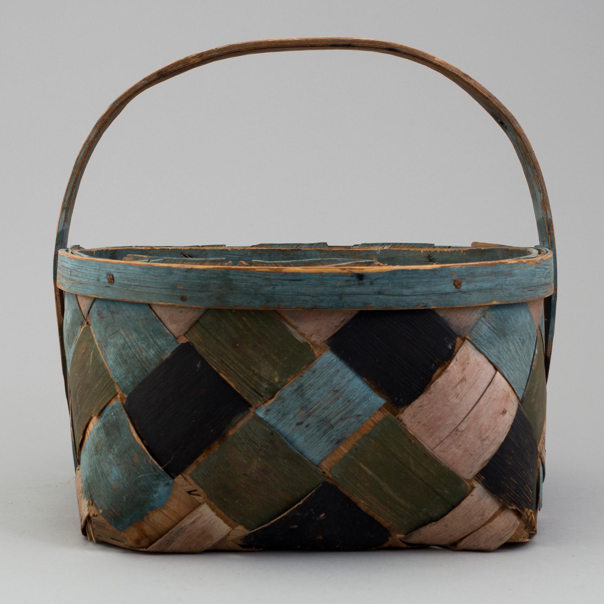a painted basket from the 19th century.