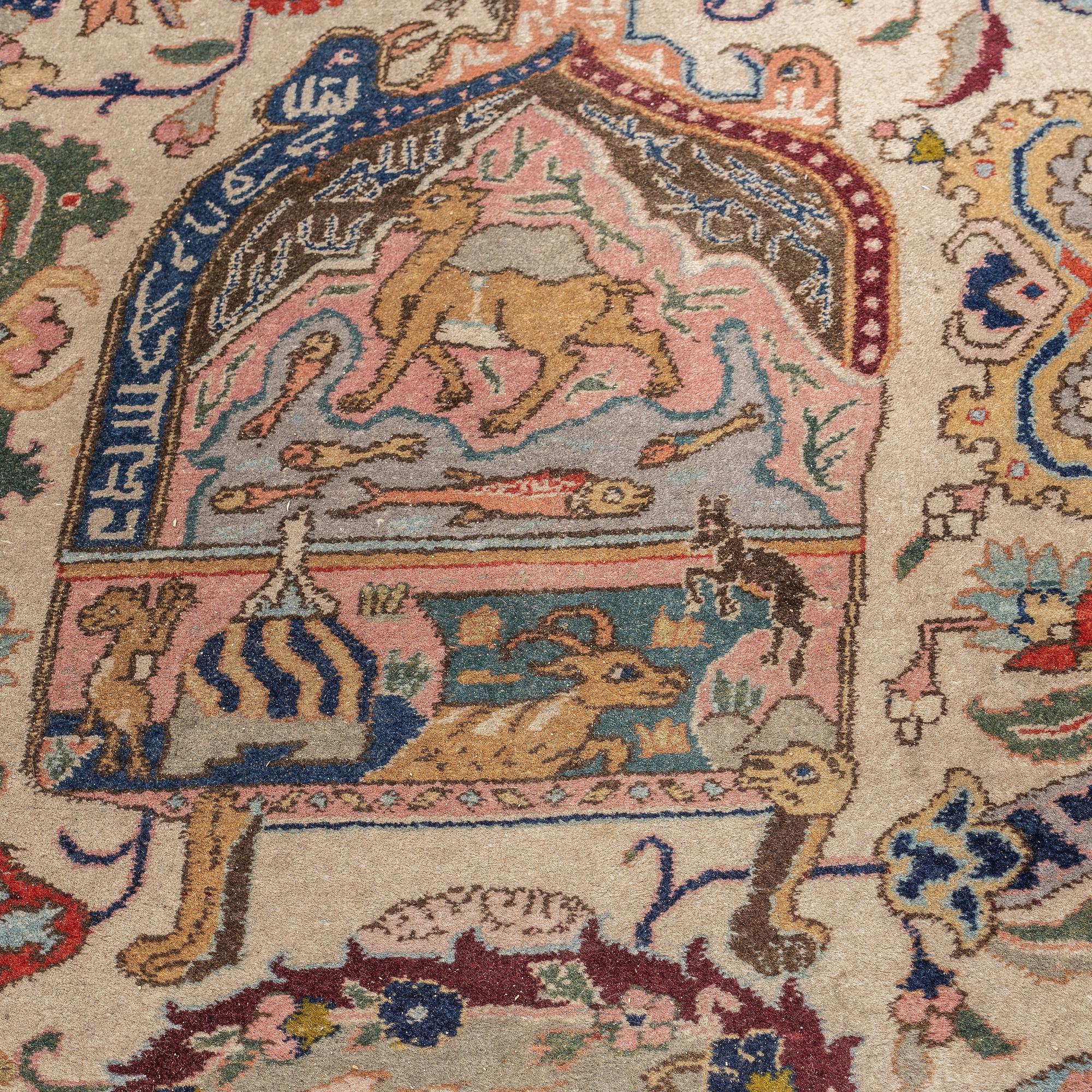 A carpet, a semi-antique Tabriz figural, ca 354,5-362 x 250,5-258 cm.
