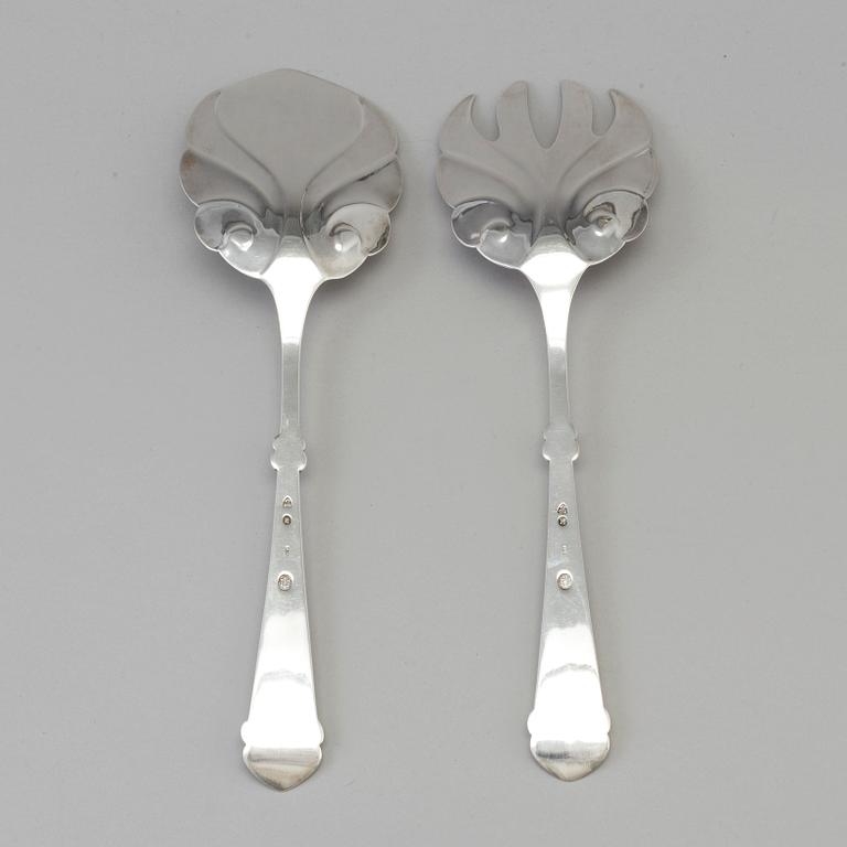 A Danish Art Nouveau silver serving spoon and fork, maker's mark Axel Oluf Olsen, Copenhagen 1914.