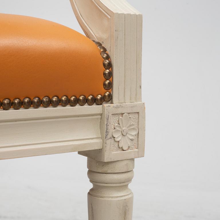 A pair of armchairs, Gustavian style, 20th century.