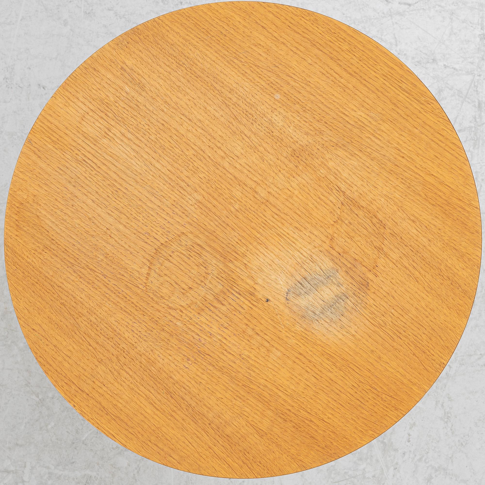 Yngve Ekström, a 'Lamino' armchair and sidetable, Swedese, Sweden, early 21st century.