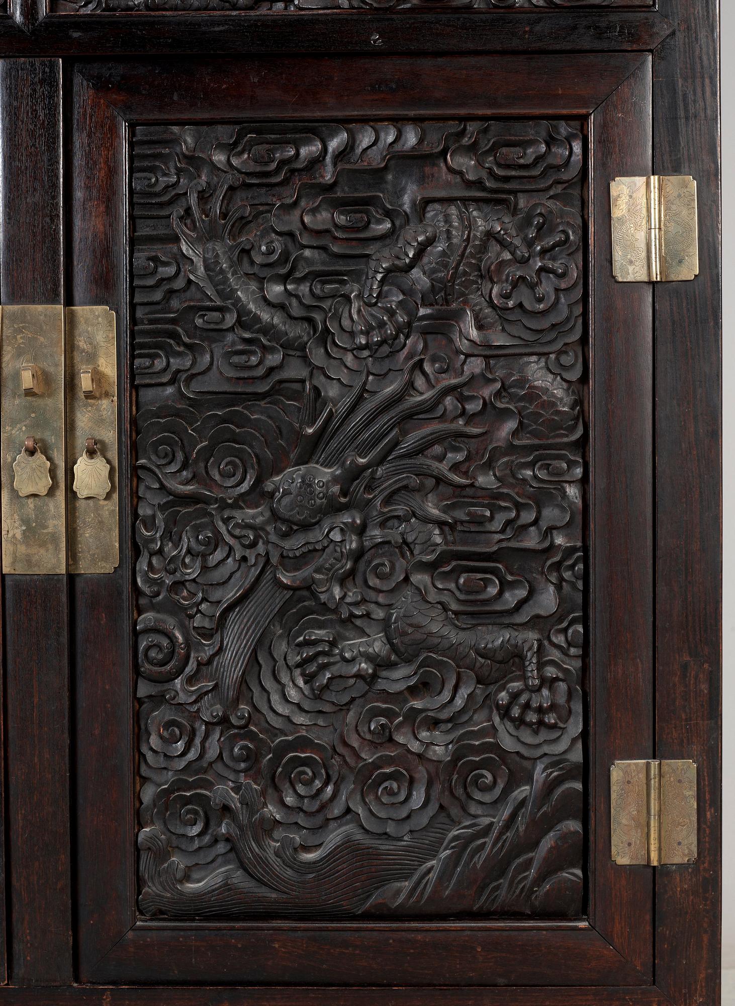 A Chinese hardwood cabinet, early 20th Century.