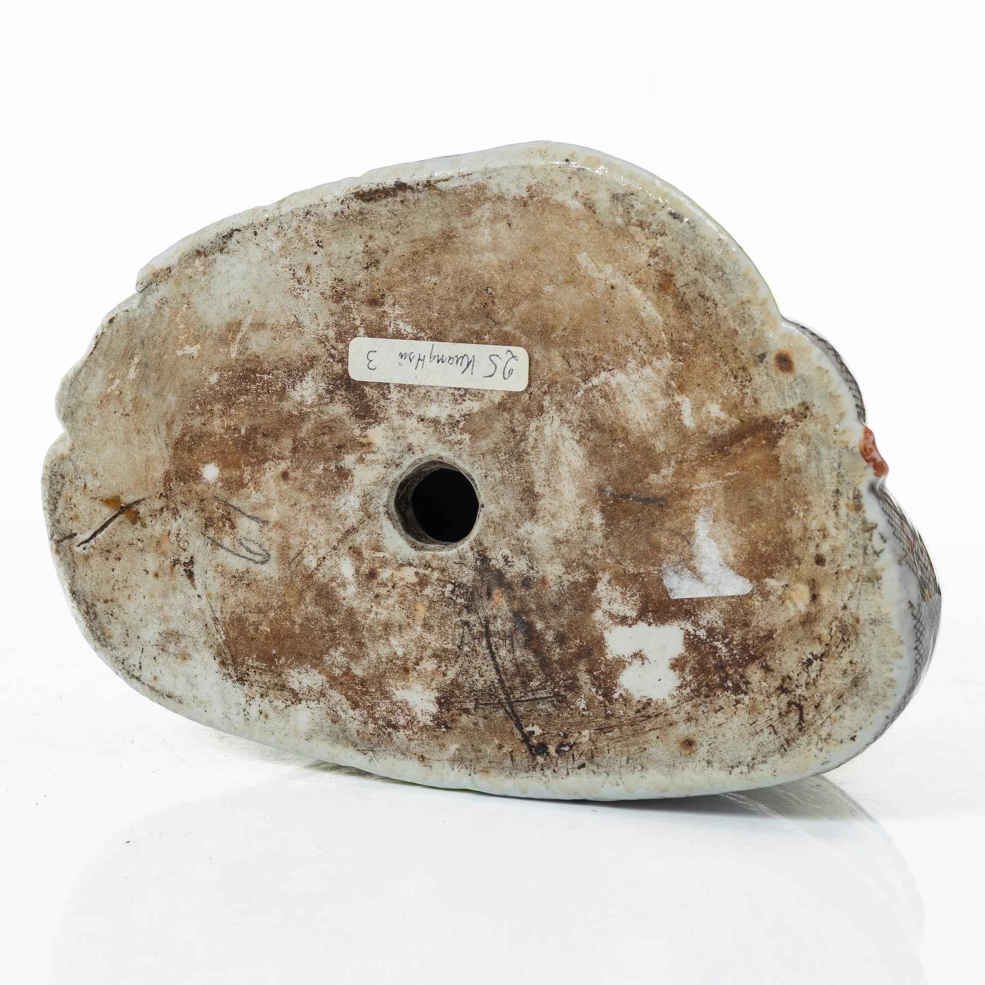 A Chinese famille rose porcelain figure of a Budai, around 1900.