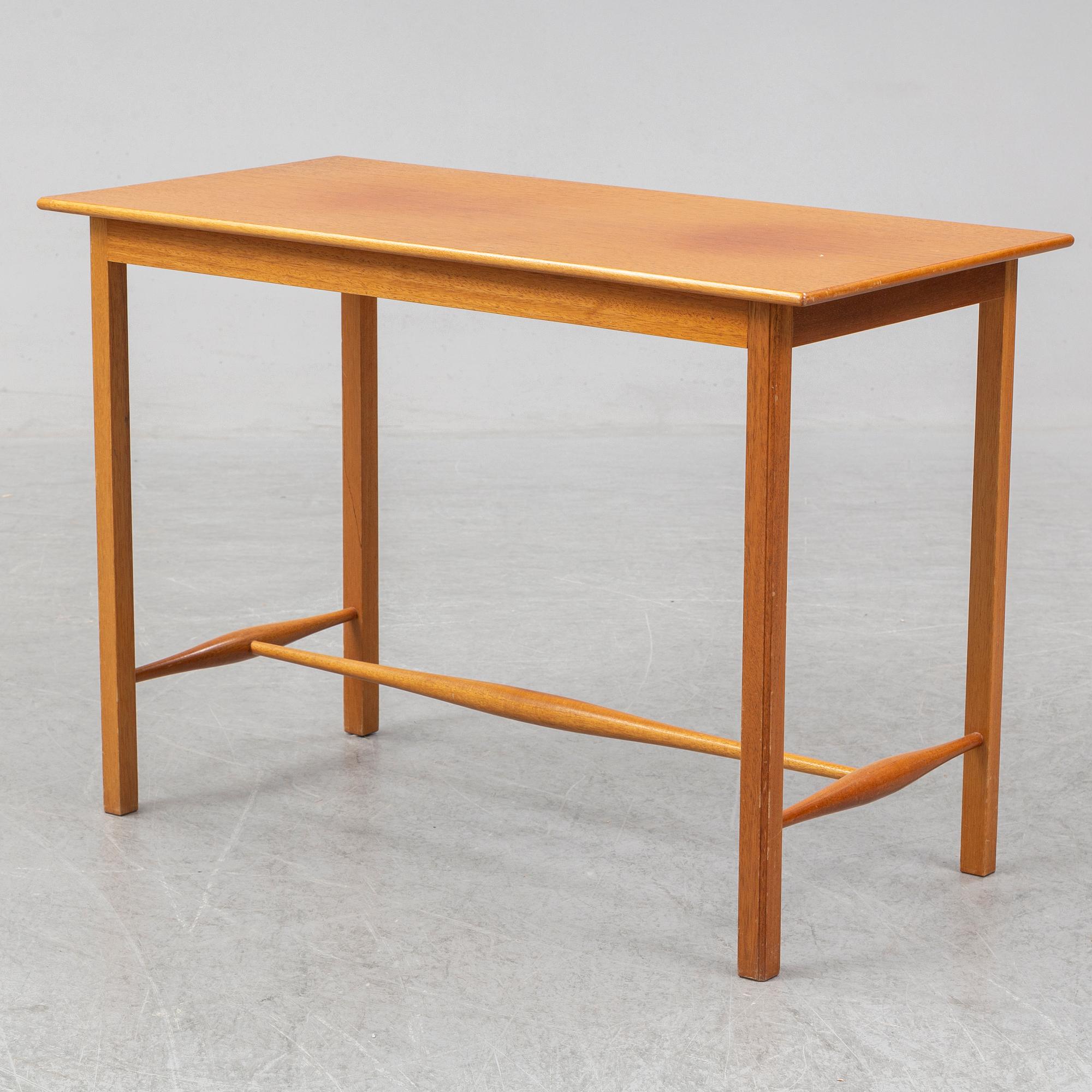 A model 1106 mahogany side table by Josef Frank for Firma Svenskt Tenn.