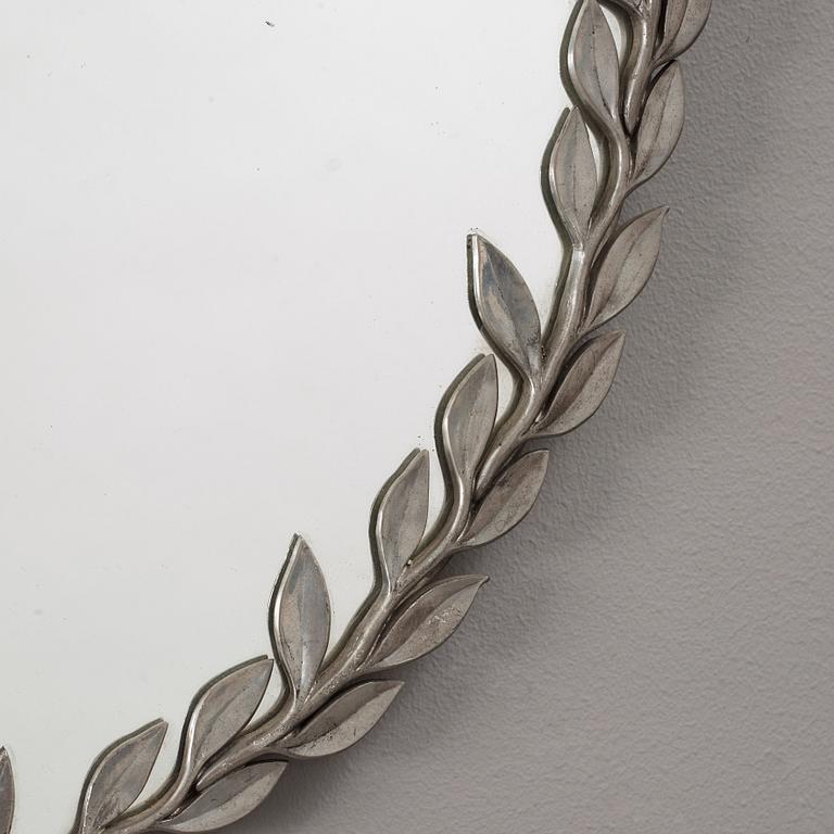 Estrid Ericson, a pewter mirror, Svenskt Tenn, Stockholm 1955.