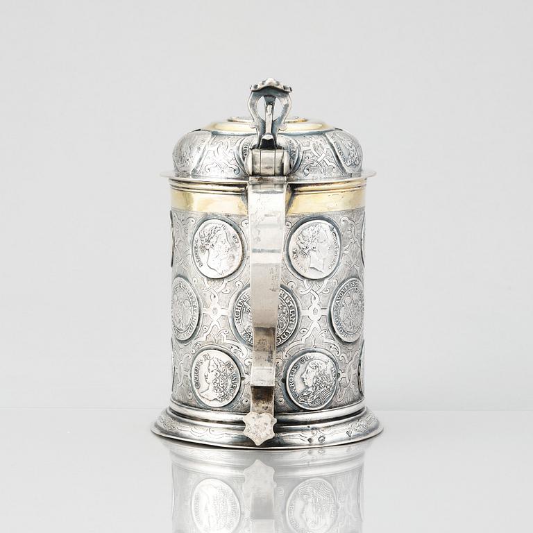 A German 18th century parcel-gilt silver coin-tankard, mark of Johann Friedrich Beyer, Schweidnitz (1736-1775).