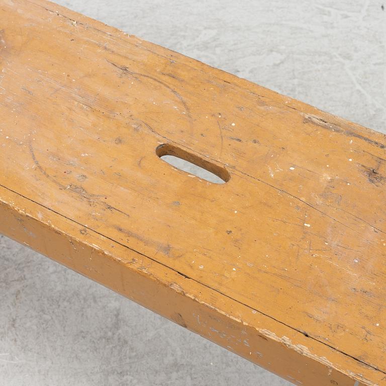 A painted bench, circa 1900.