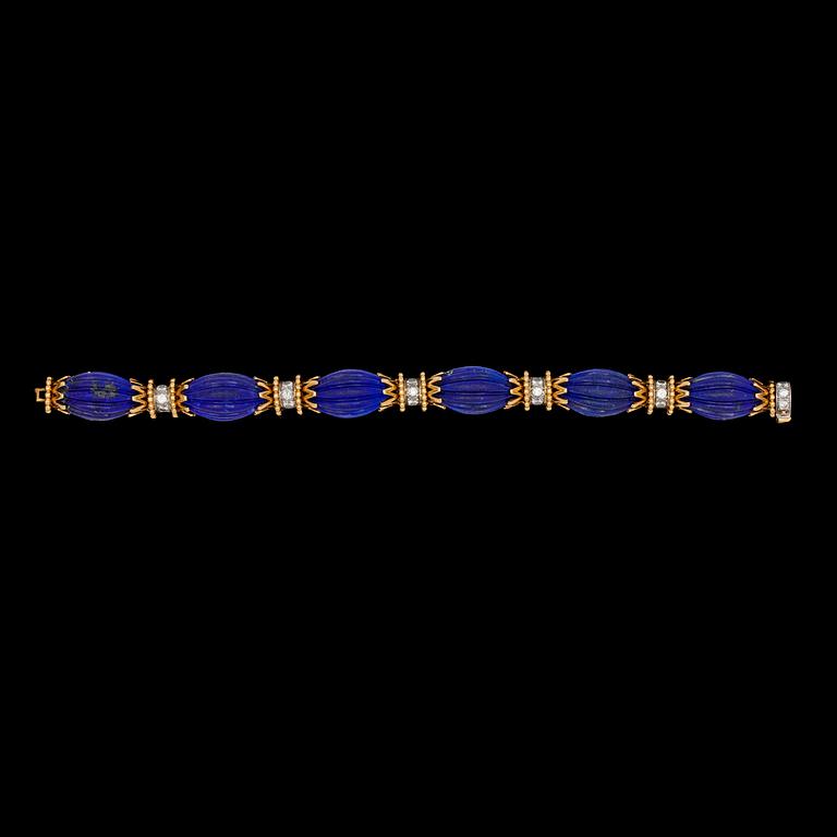 A Van Cleef & Arpels gold, lapis lazuli and brilliant cut diamond bracelet, tot. app. 1.50 cts. 1960's.