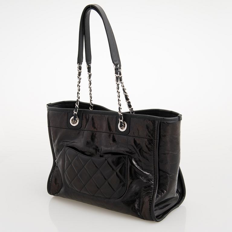 CHANEL, A Large Black Leather Shopping Bag.