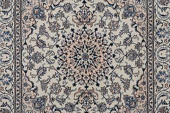 A rug, Nain, part silk, ca 200 x 195 cm.