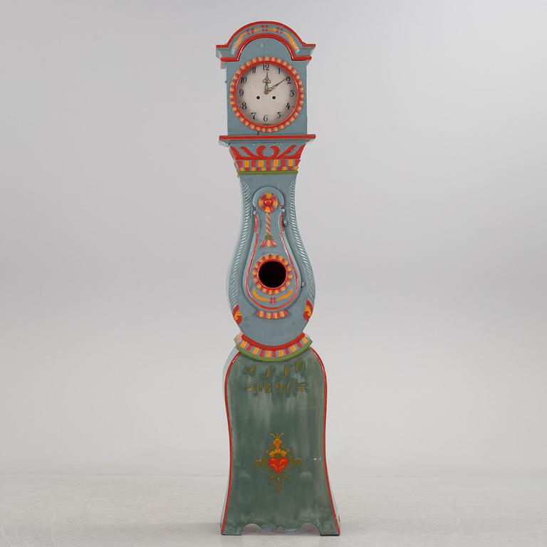 a painted grandfather-clock from the first half of the 19th century.