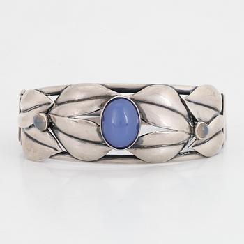 Silver and chalcedony bangle.