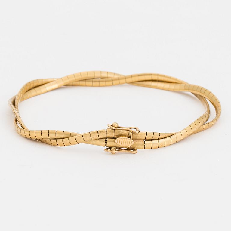 A two-rowed Omega link bracelet.