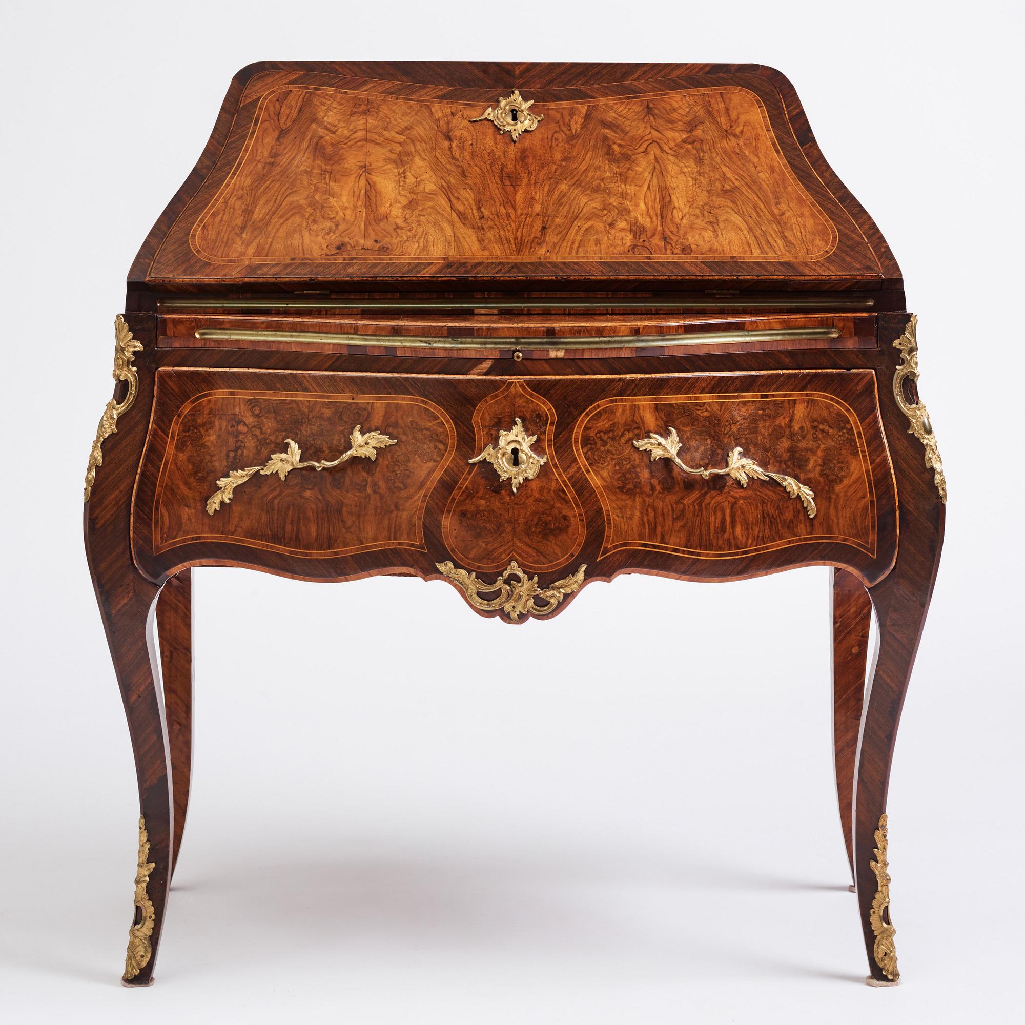A rosewood, walnut, and gilt brass-mounted rococo secretaire by J. H. Reimers (master in Stockholm 1754-73).