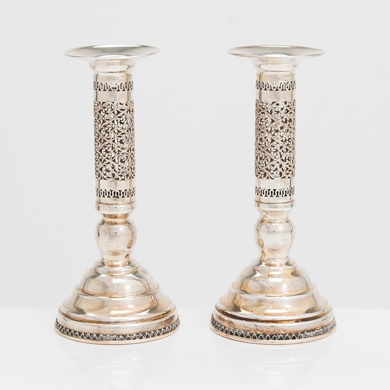 A pair of sterling silver candlesticks, latter half of the 20th century. Unidentified maker's mark.