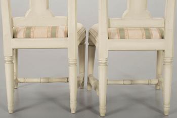 A piar of signed Swedish Gustavian chairs.