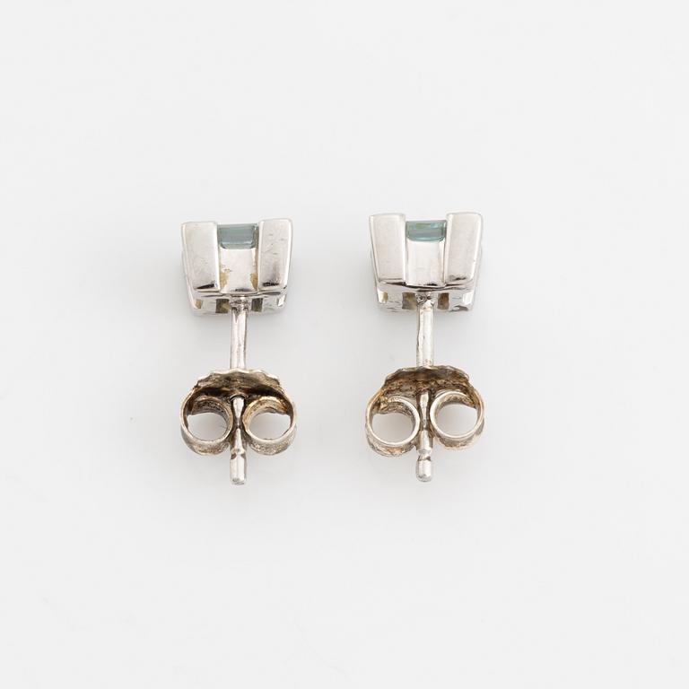 Ring, pendant, and a pair of earrings, 18K white gold with topaz and small diamonds.