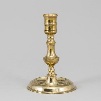 A bronze candlestick, 17th/18th century.