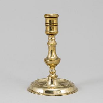 A bronze candlestick, 17th/18th century.