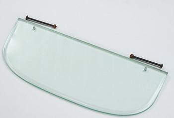 Italian designer, a wall mirror, 1950-60's. Emerald green tinted glass and brass frame.