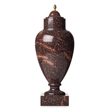 110. A Swedish early 19th century porphyry urn.