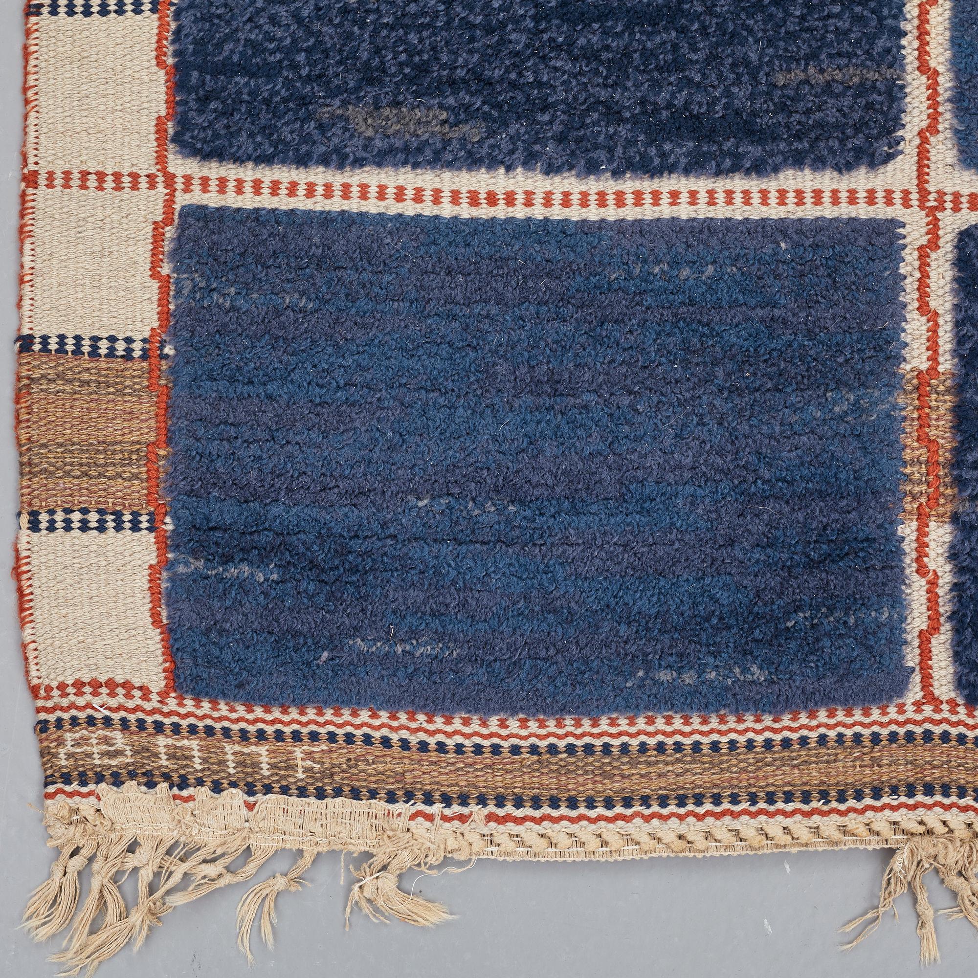 Märta Måås-Fjetterström, A CARPET, "Rutig blå halvflossa", knotted pile in relief, ca 304 x 209,5 cm, signed AB MMF.