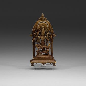 234. A seated bronze figure of a deity, Himachal Pradesh, presumably 12th Century.