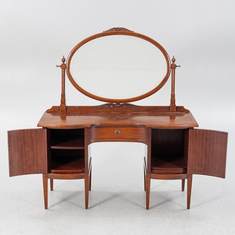 A mahogany veneered dressing table with a mirror, early 20th Century.