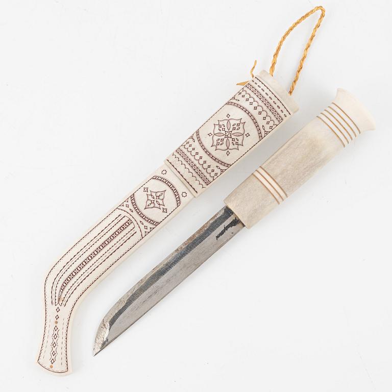 Thore Sunna, a reindeer horn knife, signed.