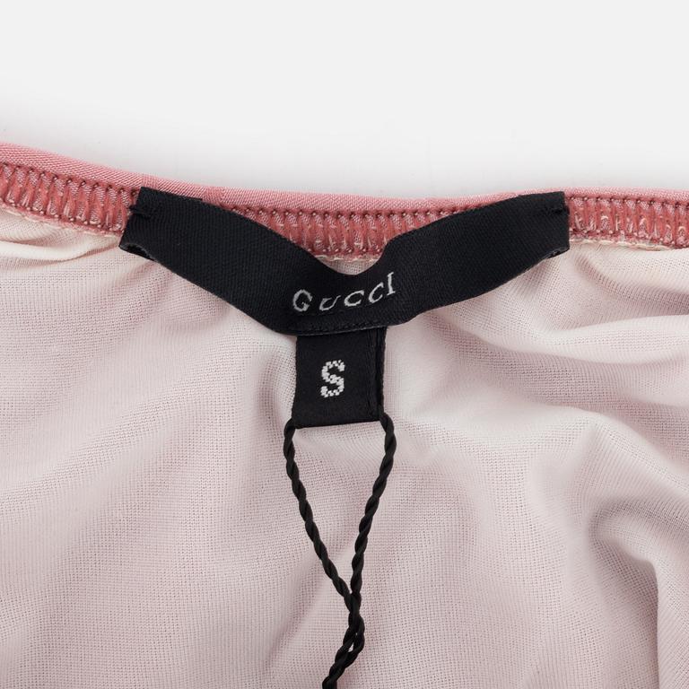 Gucci, a bathing suit, size S.