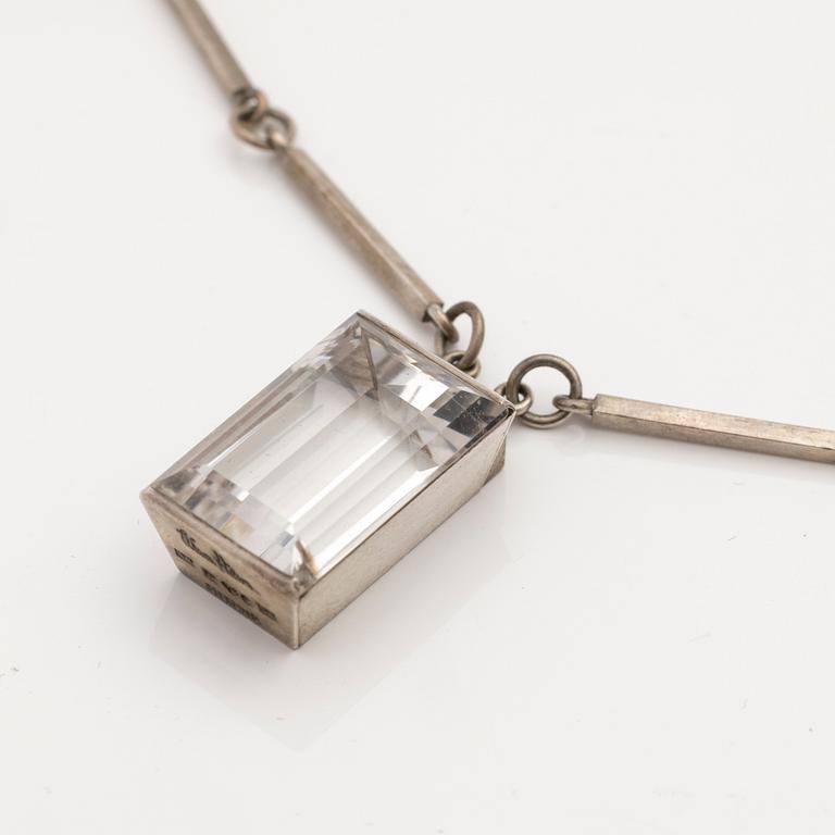 Wiwen Nilsson, Pendant, sterling silver with faceted rock crystal, Lund 1944.