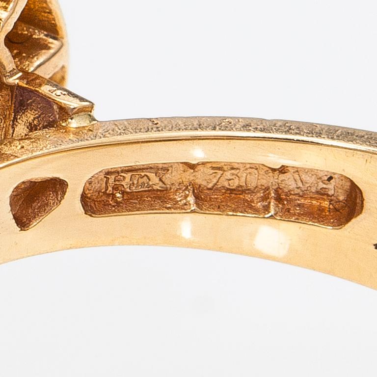 An 18K gold ring "Catherine Jagellion" with amethysts and diamonds ca. 0.37 ct in total. Ofelia Jewelry, Helsinki 1998.