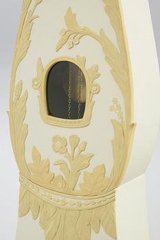 A Carl Malmsten painted and carved long case clock.