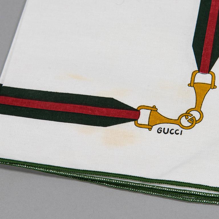 Gucci, pöytäliina ja lautasliinoja, 8 kpl.