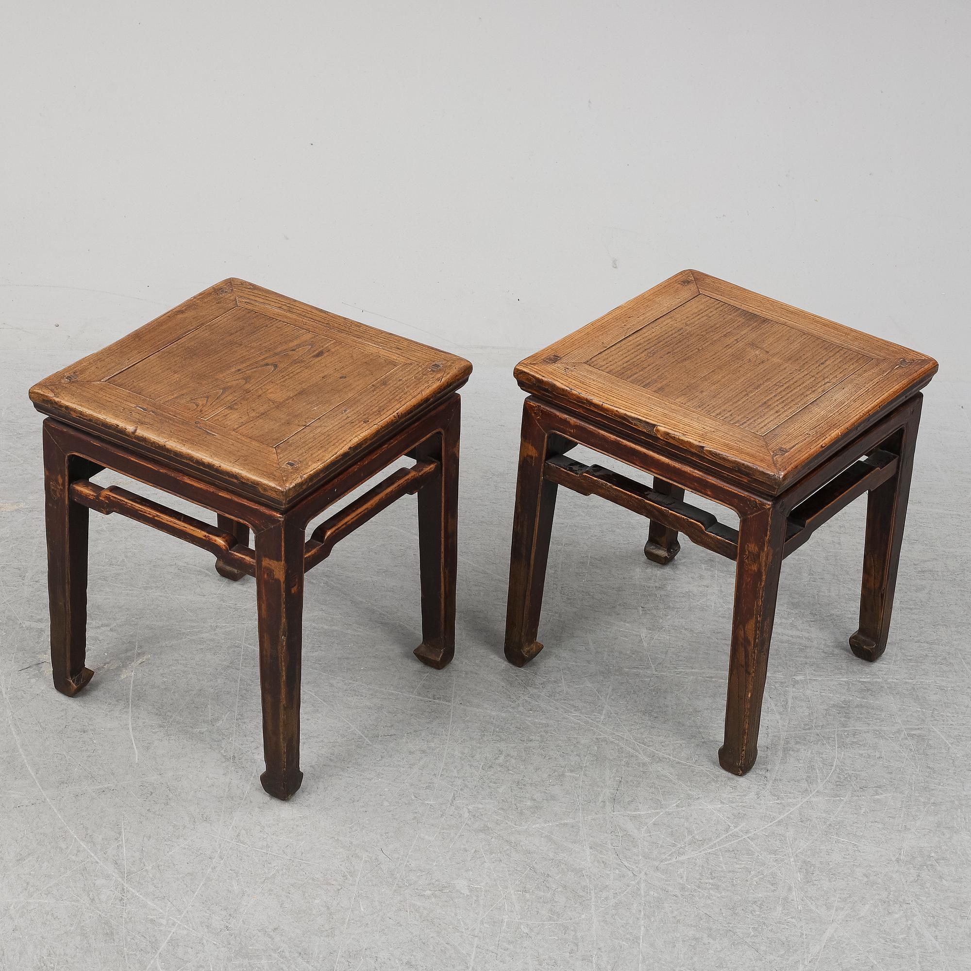 A pair of hardwood tables, 20th century.