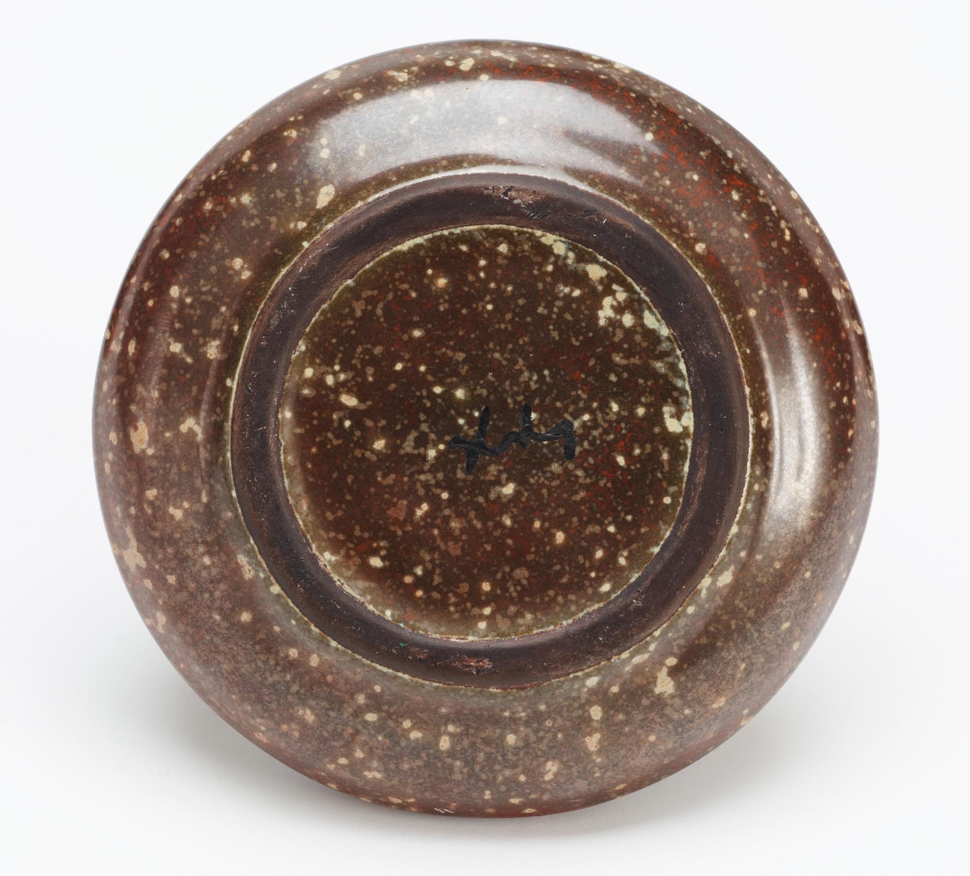 A Hans Hedberg faience bottle with stopper.