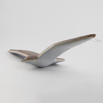A stoneware sculpture of a sea bird, unsigned.